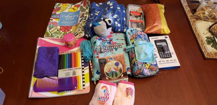 Girl 10 to 14 box for secondary school: Cloth sanitary pads, geometry set, scientific calculator.